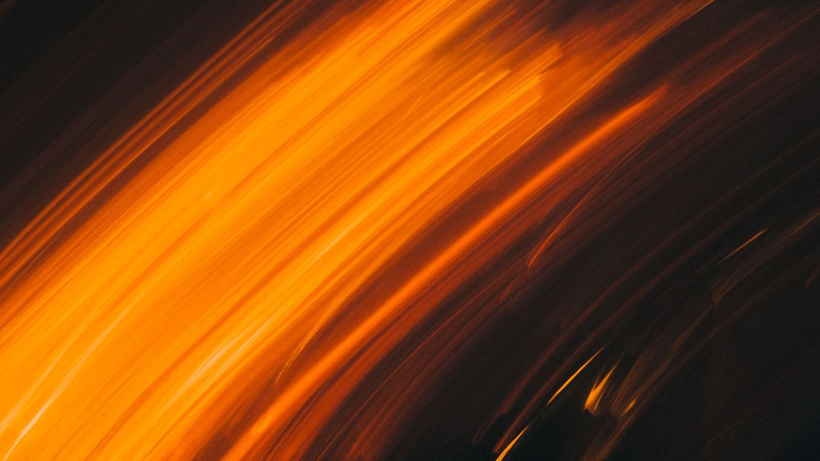 Warm orange light streaks in motion