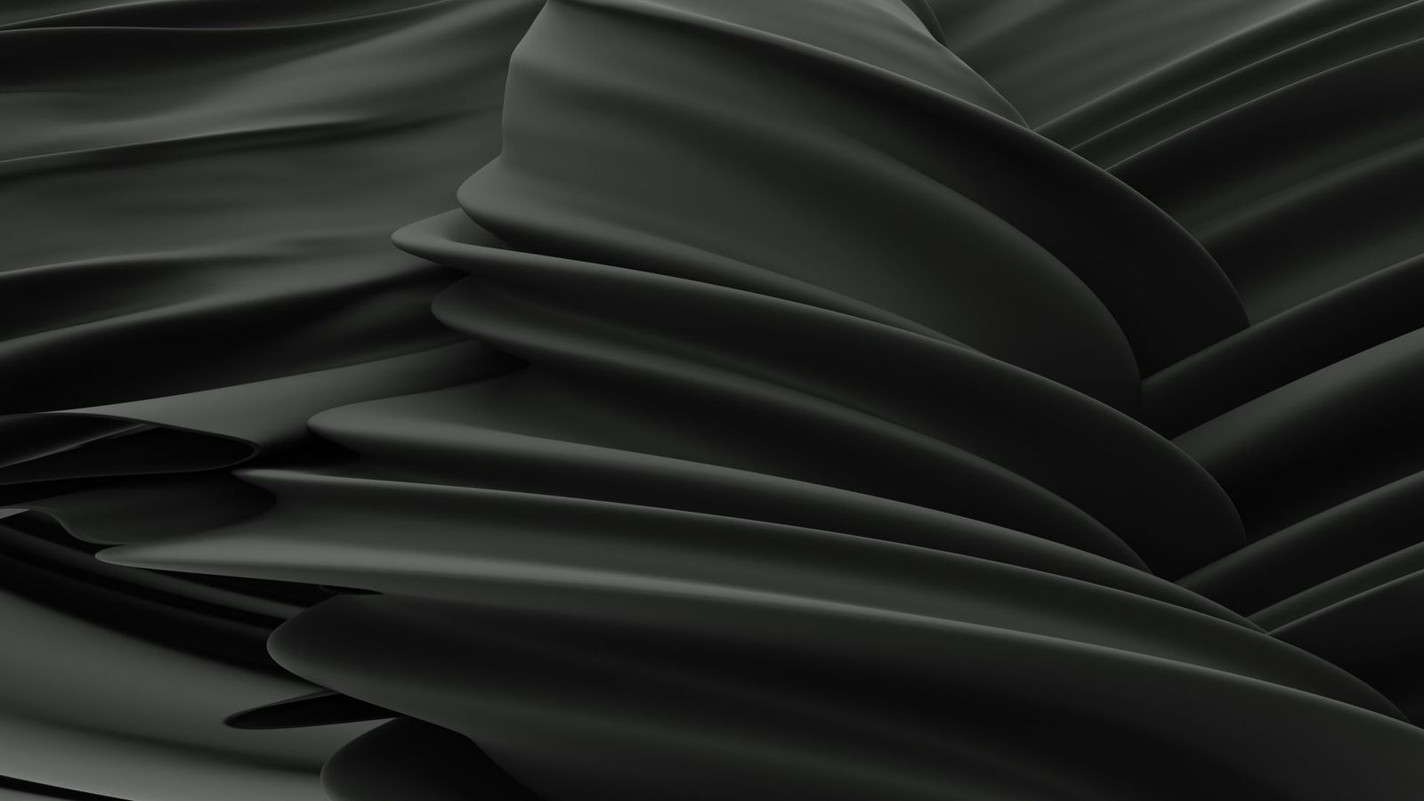 Folds of black satin fabric